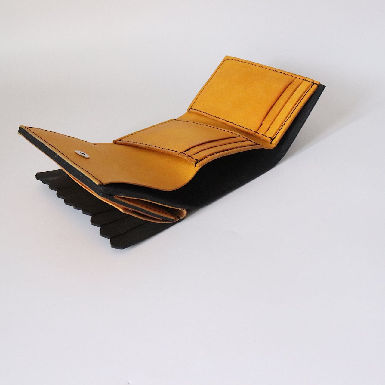 by color fringe wallet