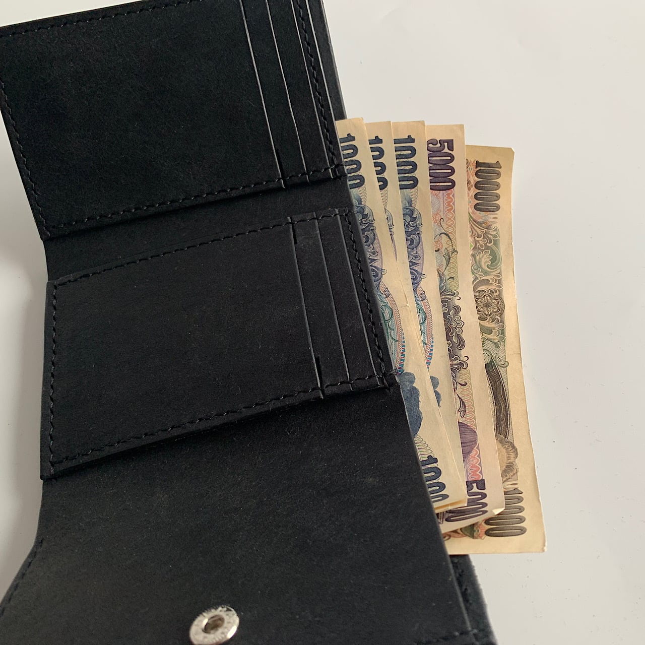 black fringe wallet