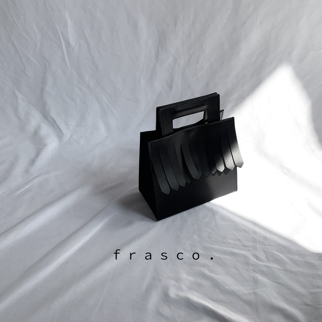 fringe hand bag