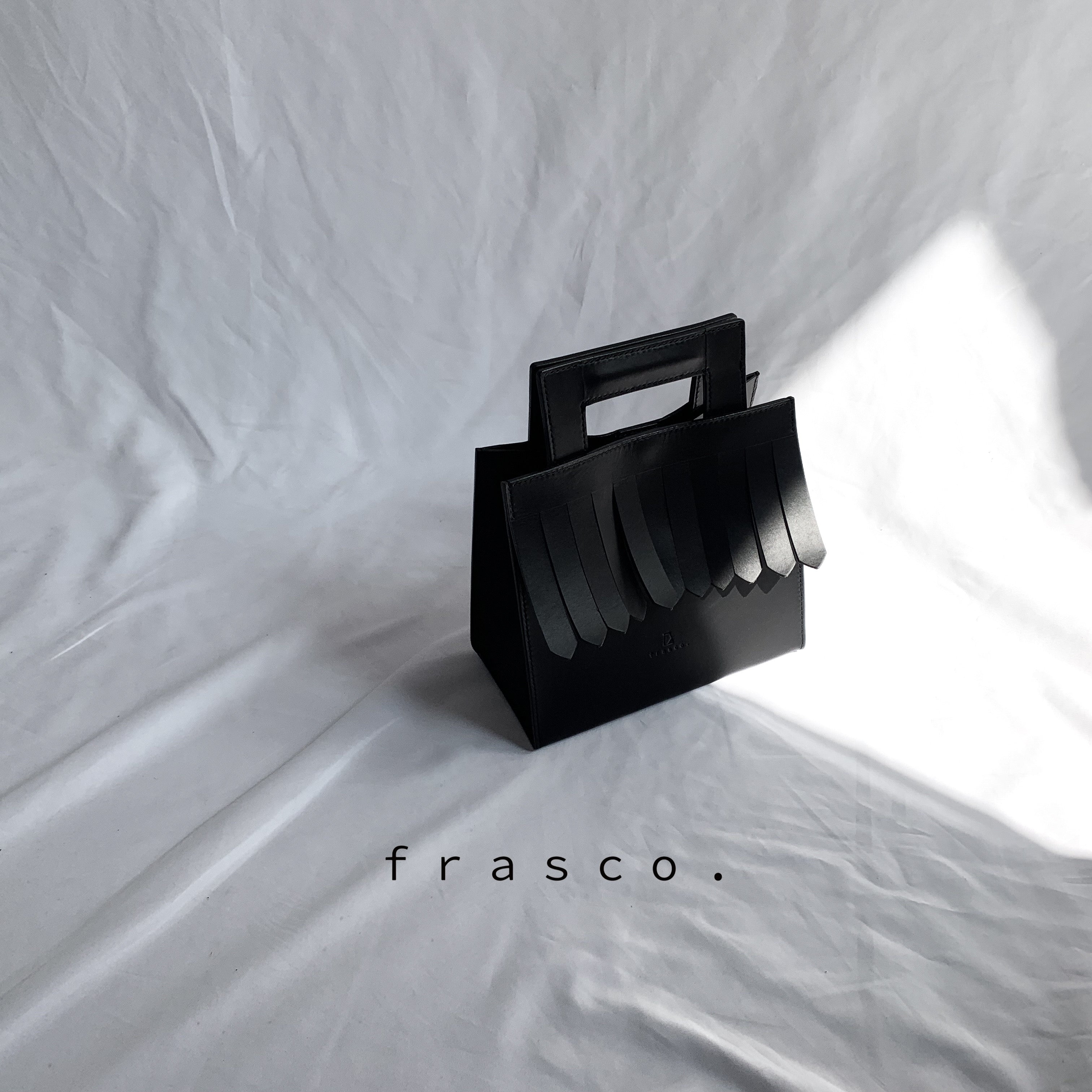 fringe hand bag