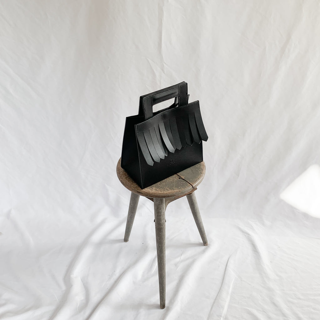 fringe hand bag