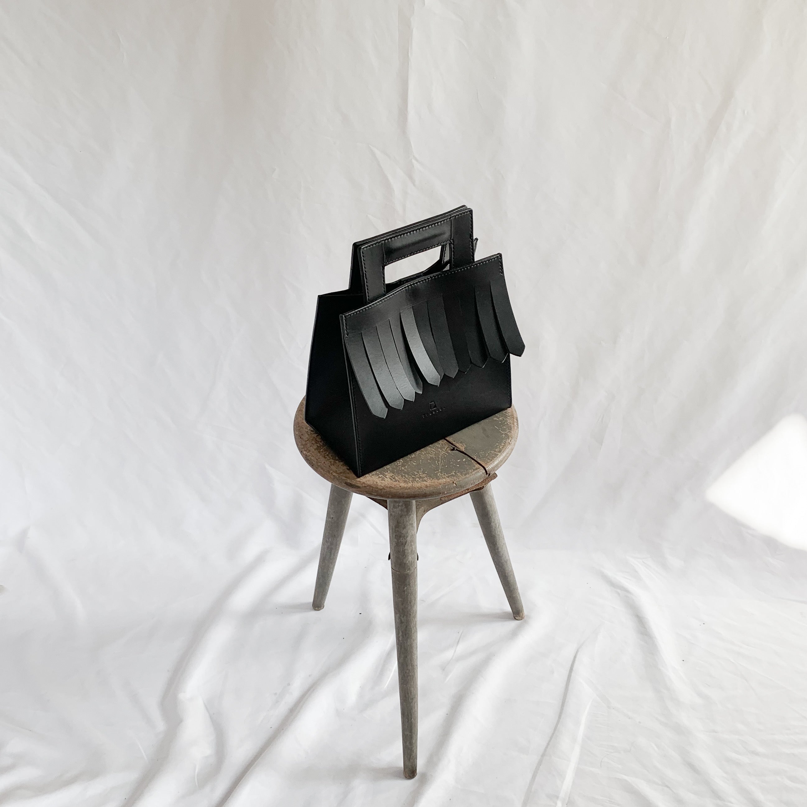fringe hand bag