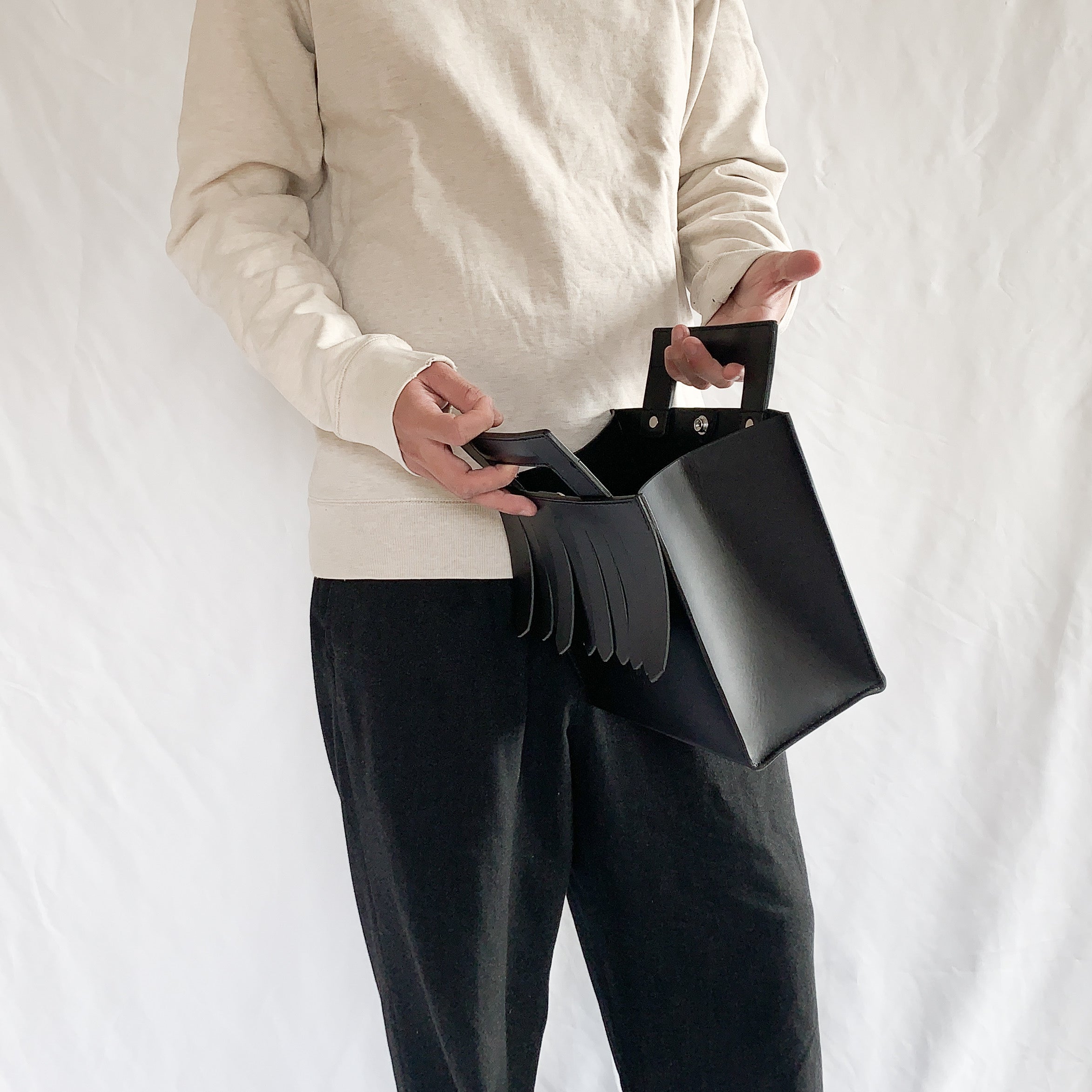 fringe hand bag