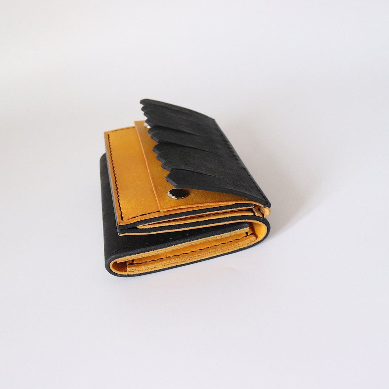 by color fringe wallet