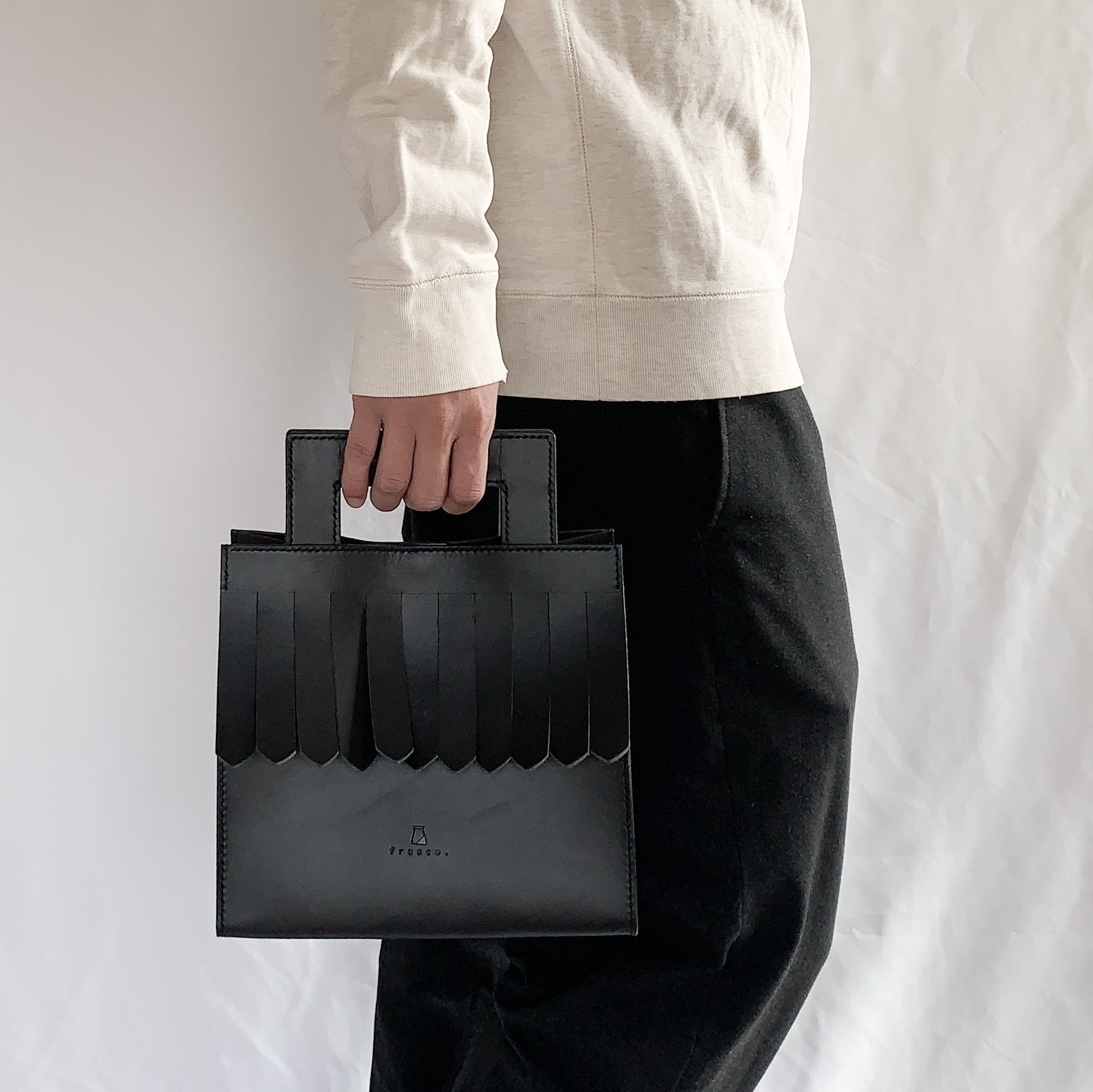fringe hand bag