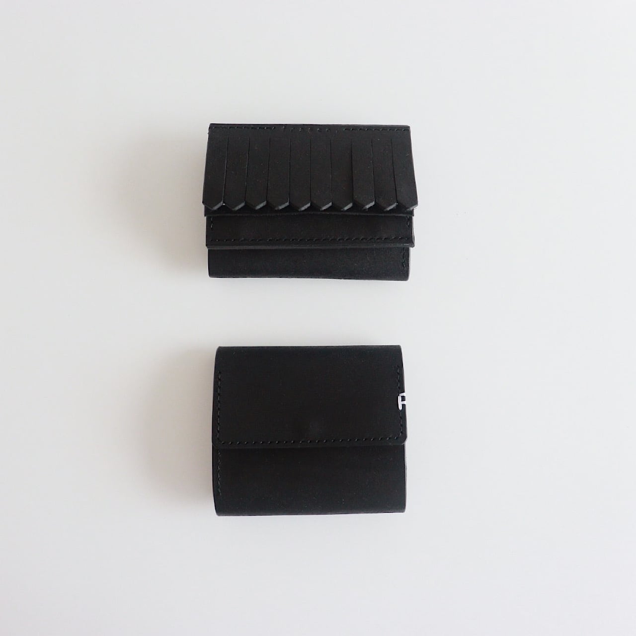black fringe wallet