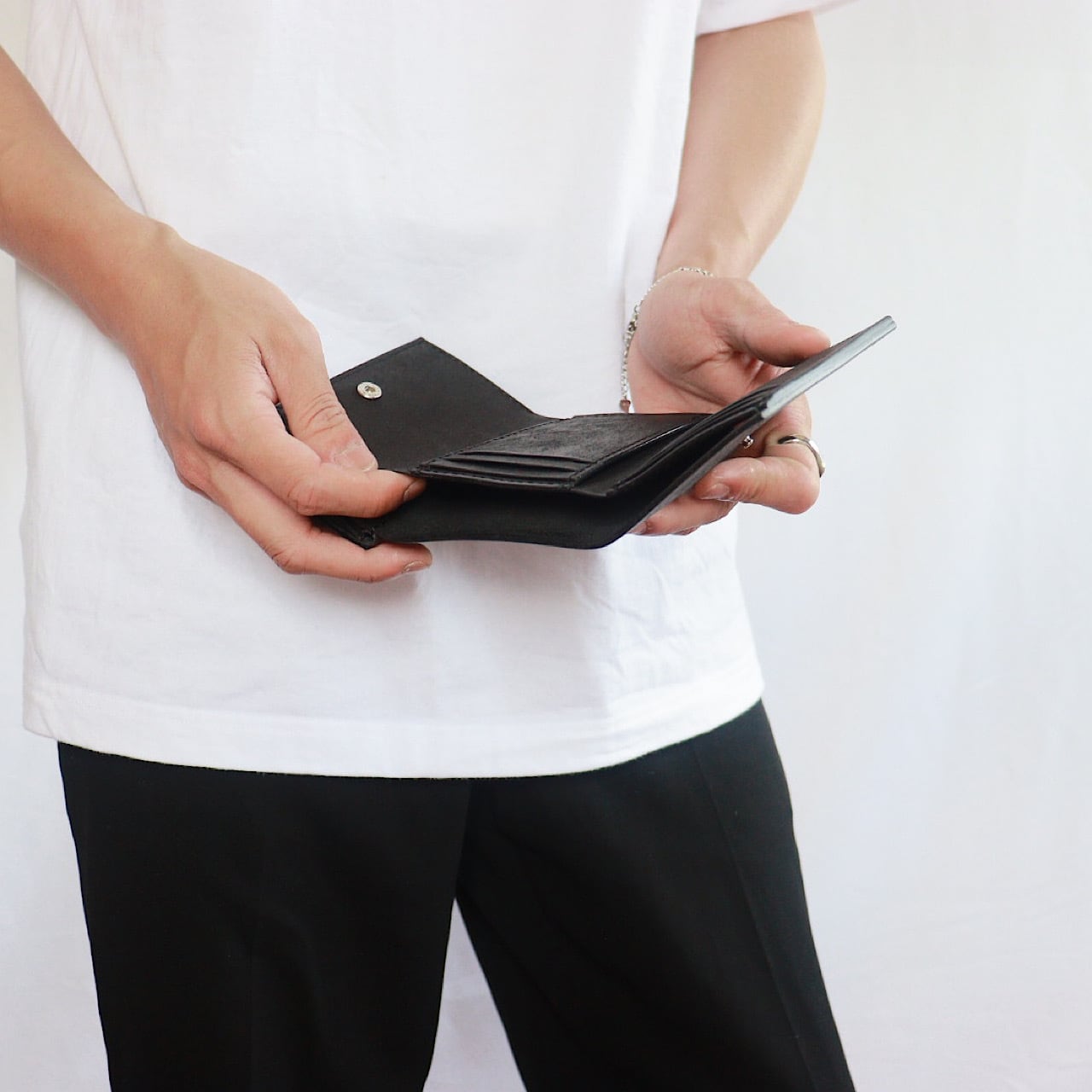 black fringe wallet
